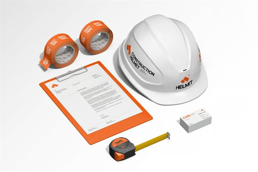 Branded merchandise set: printed hard hat, duct tape, clipboard, letterhead and business cards